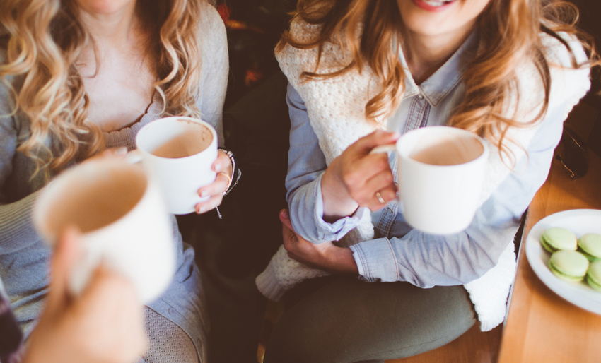 girls drinking coffee mansion house